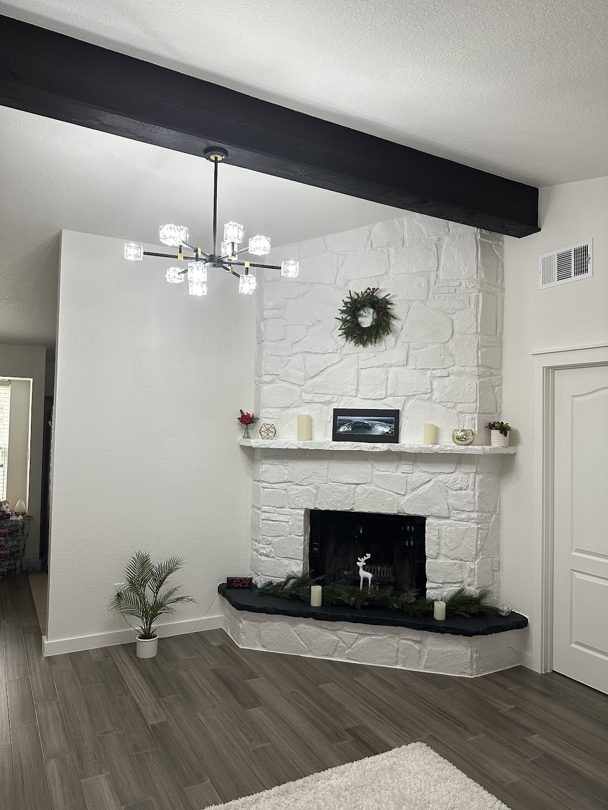 Living room fireplace and ceiling beam renovation